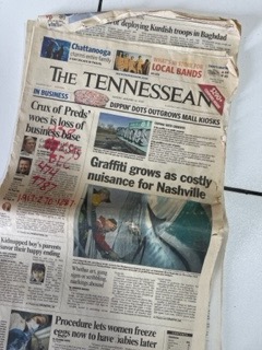 The image is a photo of the front page of the Tennesseean newspaper with an article and photos of graffiti in Nashville Tennessee on January 14, 2007.