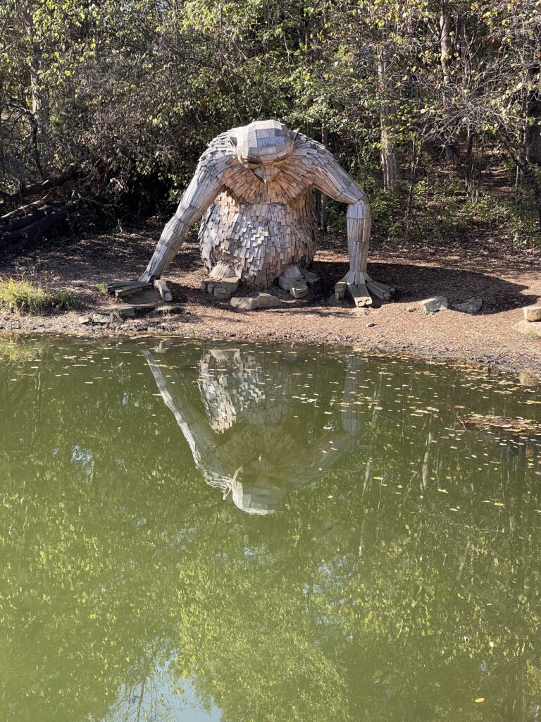 The image captures Little Nis one of the Forest Giants by Thomas Dambo at the Bernheim Arboretum and Research Forest in Kentucky.