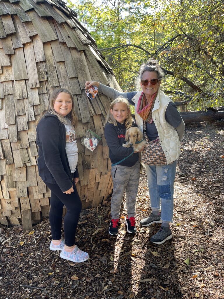 The image is of two sisters I met at the Giant Forest at the Bernheim Arboretum and Research Forest as they were hanging fabric hearts they had made for others to find.